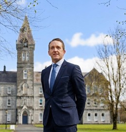 Donal Cahir, Principal, in front of the 1881 bell tower